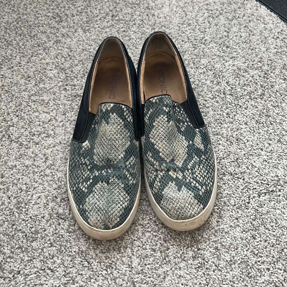 Dark snakeskin flat